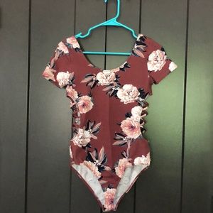 Floral bodysuit with side cutouts
